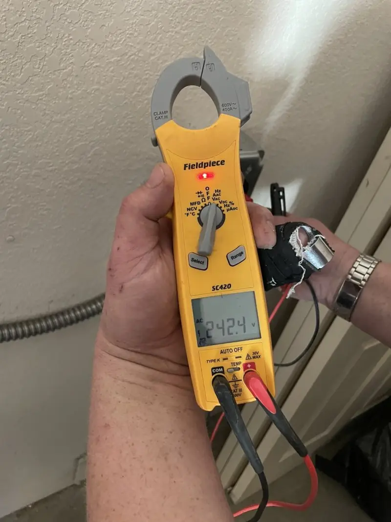 Voltage testing with clamp meter during Generator Installation in Carlsbad